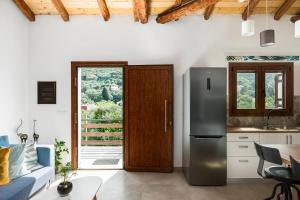 Kuchyň nebo kuchyňský kout v ubytování Eloise Apartments