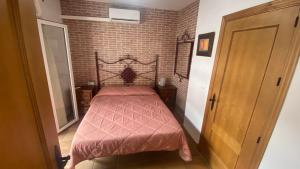 Postel nebo postele na pokoji v ubytování Casa Rural Los Pepe Sancti Petri