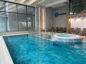 Hồ bơi trong/gần Baltic View REWAL 4-pax MOKKA