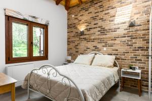 Postel nebo postele na pokoji v ubytování Eloise Apartments