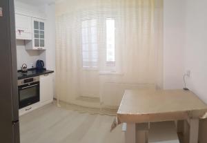 Kuchyň nebo kuchyňský kout v ubytování ЖК Алтын Шар Туран - Керей Жанибек Хандар левый берег + 14 fotografií