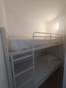 Posteľ alebo postele v izbe v ubytovaní Canet plage T2 + cabine clim et piscine