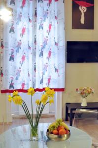 Televízia a/alebo spoločenská miestnosť v ubytovaní Dorothilux Apartment