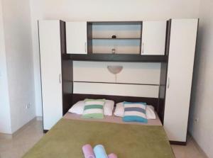 Postel nebo postele na pokoji v ubytování Studio apartmani Ante
