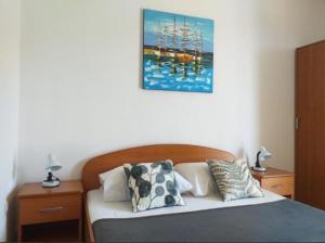 Postel nebo postele na pokoji v ubytování Studio apartmani Ante