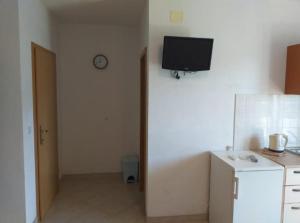 Kuchyň nebo kuchyňský kout v ubytování Studio apartmani Ante