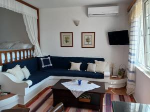 Posezení v ubytování Evelinas Apartement