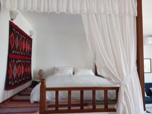Postel nebo postele na pokoji v ubytování Evelinas Apartement