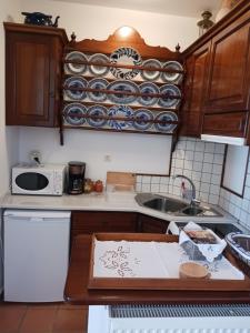Kuchyň nebo kuchyňský kout v ubytování Evelinas Apartement