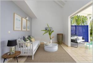 Posezení v ubytování Villa Mango 150 mètres plage à pied