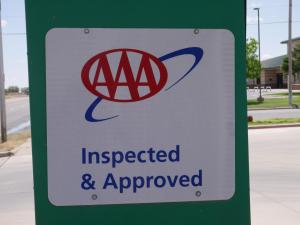 a sign that says injected and approved on a street at Irish Inn and Suites in Muleshoe +11 photos