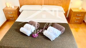 A bed or beds in a room at SA TORRETA 1