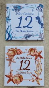 dos señales para una boda temática de sirenas con estrella de mar en La Stella Marina, en Bari Sardo
