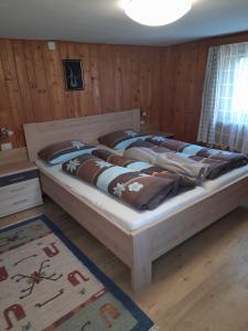 Postel nebo postele na pokoji v ubytování Oberhöher Apt Talblick
