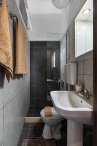 Et badeværelse på Appartamento Mare calmo-Myrtos