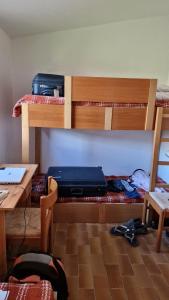 Poschodová posteľ alebo postele v izbe v ubytovaní Villa Terra Bella