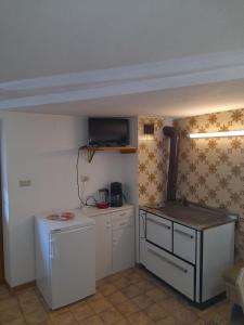 Kuchyň nebo kuchyňský kout v ubytování Oberhöher Apt Talblick