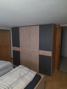 Postel nebo postele na pokoji v ubytování Oberhöher Apt Talblick