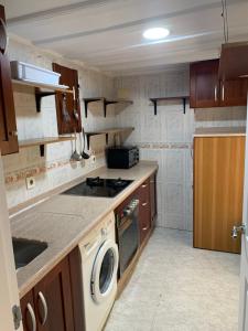 Kuchyňa alebo kuchynka v ubytovaní Apartamento en Cádiz capital