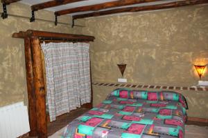 Postel nebo postele na pokoji v ubytování Apartamentos Jaronil