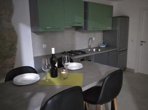 Kuchyň nebo kuchyňský kout v ubytování Apartman Lari