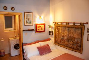 A bed or beds in a room at Yangos traditional home