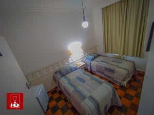 Letto o letti in una camera di Hotel Bruggemann