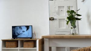 TV a/nebo společenská místnost v ubytování Wallada Mezquita