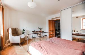 Postel nebo postele na pokoji v ubytování Apartmán Masaryk