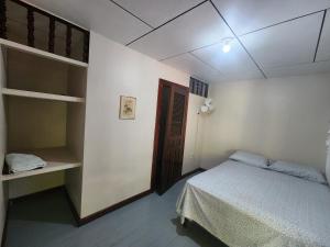 Letto o letti in una camera di Fenix Hotel & Hostel