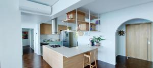 a kitchen with a white counter top in a room at COBAR0108 - Edifício Oceania in Salvador