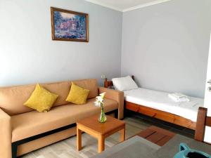 Postel nebo postele na pokoji v ubytování Alexa apartament