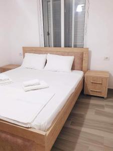 Postel nebo postele na pokoji v ubytování Alexa apartament