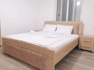 Postel nebo postele na pokoji v ubytování Alexa apartament