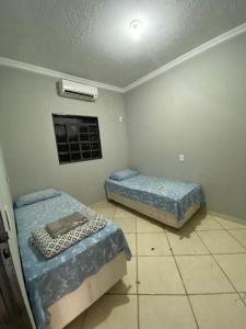 Ένα ή περισσότερα κρεβάτια σε δωμάτιο στο Pousada São José