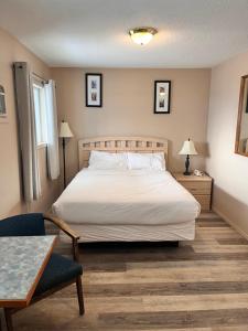 Postel nebo postele na pokoji v ubytování Skimmerhorn Inn