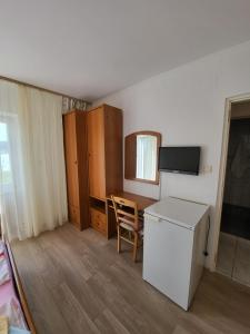 Kuchyň nebo kuchyňský kout v ubytování Apartmani Mira