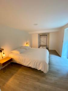 Posteľ alebo postele v izbe v ubytovaní Ty Guenhaël petite maisonnette avec extérieur intra-muros proche port de Vannes