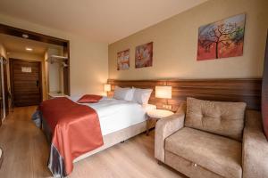 Postel nebo postele na pokoji v ubytování Hotel Schwarzbachtal Hideaway