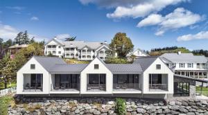 a house on top of a hill with rocks at Outlook Inn on Orcas Island in Eastsound