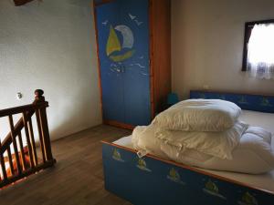 Posteľ alebo postele v izbe v ubytovaní Maison de plage