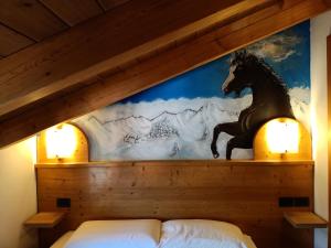 Postel nebo postele na pokoji v ubytování Hotel Cielo Blú
