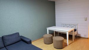 Posezení v ubytování Laksevåg Apartment