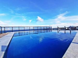 Bazén v ubytování Atlântico Tambaú nebo v jeho okolí