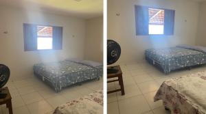 a bedroom with two beds and a window at Bahia da Traição in Baía da Traição