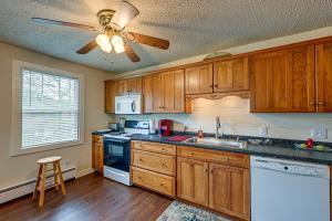 A kitchen or kitchenette at Whittier Vacation Rental Cabin with Private Hot Tub