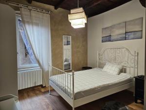 Cama o camas de una habitación en la Valletta brianza