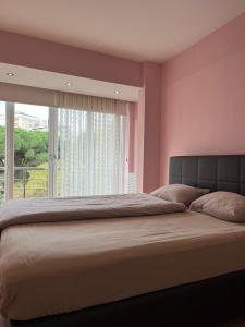 Ein Bett oder Betten in einem Zimmer der Unterkunft Full house in Fenerbahce