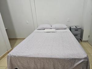 Postel nebo postele na pokoji v ubytování El Padrino