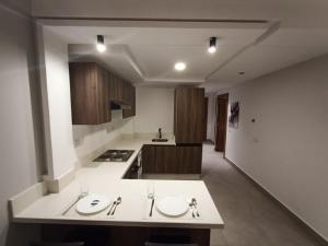 A kitchen or kitchenette at luxury studio in Casablanca